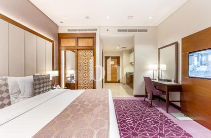 Apartment - 1 - 1 for rent in Royal Continental Suites - Business Bay - Dubai