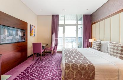 Apartment - 1 - 1 for rent in Royal Continental Suites - Business Bay - Dubai