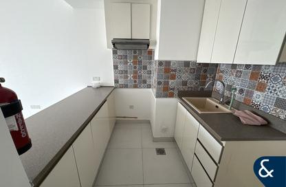 Apartment - 1 Bedroom - 2 Bathrooms for rent in Rabdan Building - Motor City - Dubai