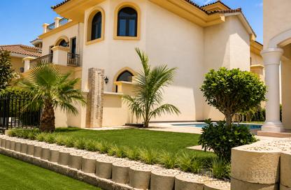Villa - 4 Bedrooms - 6 Bathrooms for rent in Garden Homes Frond B - Garden Homes - Palm Jumeirah - Dubai
