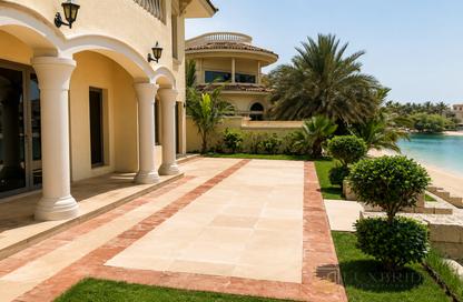 Villa - 4 Bedrooms - 6 Bathrooms for rent in Garden Homes Frond B - Garden Homes - Palm Jumeirah - Dubai