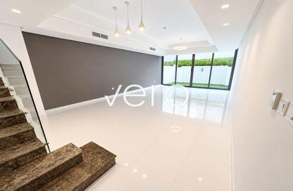 Villa - 4 - 5 for rent in Gardenia Townhomes - Wasl Gate - Dubai