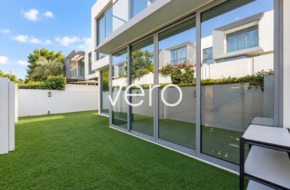 Villa - 4 - 5 for rent in Gardenia Townhomes - Wasl Gate - Dubai