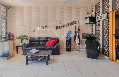 Shop - Studio for rent in Building Y23 - England Cluster - International City - Dubai