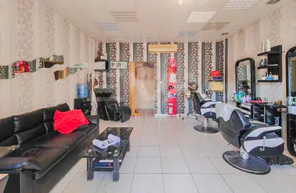 Shop - Studio for rent in Building Y23 - England Cluster - International City - Dubai