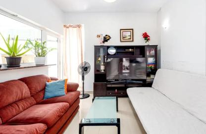 Apartment - 1 Bedroom - 2 Bathrooms for sale in Cricket Tower - Dubai Sports City - Dubai