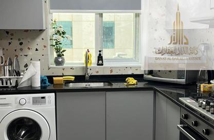 Apartment - 1 - 2 for sale in Pearl Tower - Emirates City - Ajman