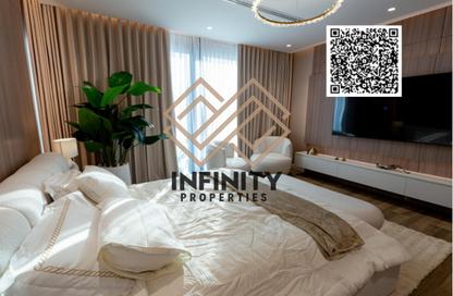 Apartment - 2 Bedrooms - 2 Bathrooms for sale in Orchid Towers - Tiger Downtown Ajman - Al Alia - Ajman