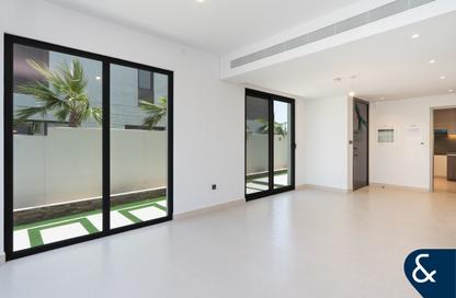 Villa - 4 - 5 for sale in Aura Gardens - Tilal Al Ghaf - Dubai