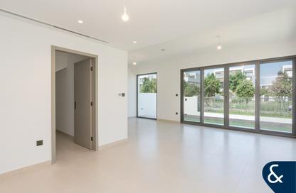 Villa - 4 - 5 for sale in Aura Gardens - Tilal Al Ghaf - Dubai