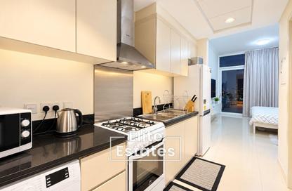 Apartment - Studio - 1 for rent in Carson B - Carson - Damac Hills - Dubai