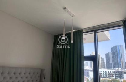 Apartment - Studio - 1 for rent in National Bonds Residence - District 15 - Jumeirah Village Circle - Dubai