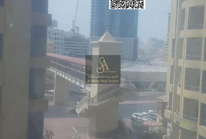 Two bedrooms and a living room at Al Khor Towers—a