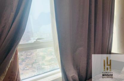 Apartment - 2 Bedrooms - 3 Bathrooms for sale in Orient Towers - Al Bustan - Ajman