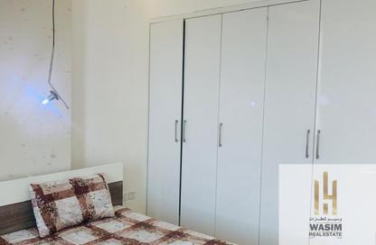 Apartment - 2 Bedrooms - 3 Bathrooms for sale in Orient Towers - Al Bustan - Ajman