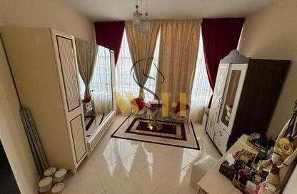 Apartment - 2 Bedrooms - 3 Bathrooms for sale in Orient Tower 1 - Orient Towers - Al Bustan - Ajman