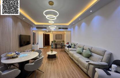 شقة - 2 غرف نوم - 3 حمامات للايجار في أورينت تاور 1 - أورينت تاور - البستان - عجمان