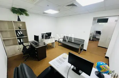 Office Space - Studio - 1 Bathroom for rent in Al Rostamani Building - Port Saeed - Deira - Dubai
