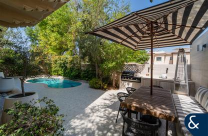 Villa - 4 - 5 for sale in Whispering Pines - Jumeirah Golf Estates - Dubai