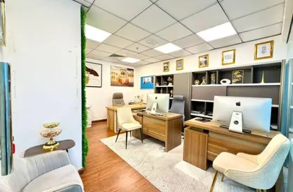 Business Centre - Studio - 4 Bathrooms for rent in Iris Bay - Business Bay - Dubai