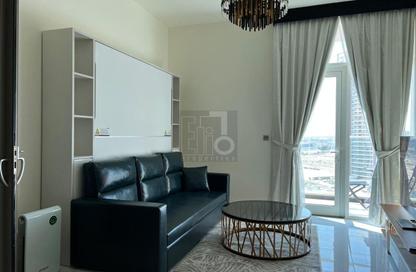 Apartment - 1 - 2 for sale in Miraclz Tower by Danube - Arjan - Dubai