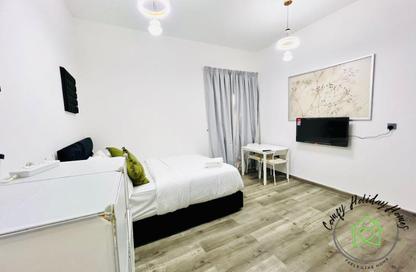 Apartment - Studio - 1 Bathroom for rent in Silicon Gates 1 - Silicon Gates - Dubai Silicon Oasis - Dubai