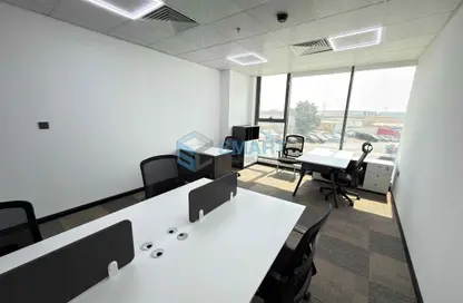 Business Centre - Studio - 4 Bathrooms for rent in Ramool New Building 2 - Umm Ramool - Dubai