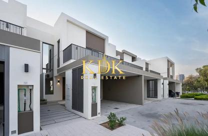 Villa - 4 - 5 for rent in Aura Gardens - Tilal Al Ghaf - Dubai
