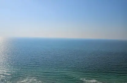 Apartment - 3 Bedrooms - 4 Bathrooms for rent in Corniche Tower - Ajman Corniche Road - Ajman