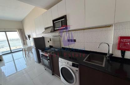Apartment - Studio - 1 for rent in Wavez Residence - Liwan - Dubai