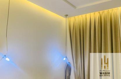 Apartment - 2 Bedrooms - 3 Bathrooms for sale in Orient Tower 2 - Orient Towers - Al Bustan - Ajman
