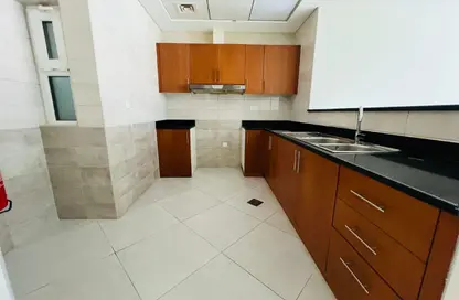Apartment - 1 Bedroom - 2 Bathrooms for rent in Sharaf DG Building - Al Karama - Dubai