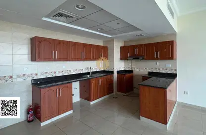 Apartment - 1 Bedroom - 2 Bathrooms for rent in Corniche Tower - Ajman Corniche Road - Ajman