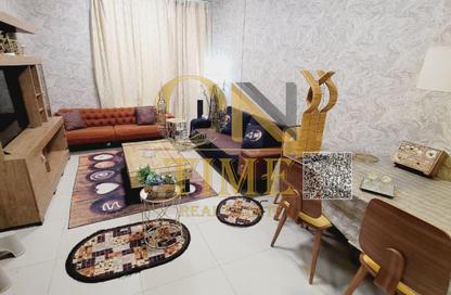 Apartment - 1 Bedroom - 2 Bathrooms for rent in Corniche Tower - Ajman Corniche Road - Ajman