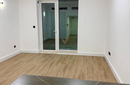 Apartment - Studio - 1 Bathroom for rent in Ice Hockey - Dubai Sports City - Dubai