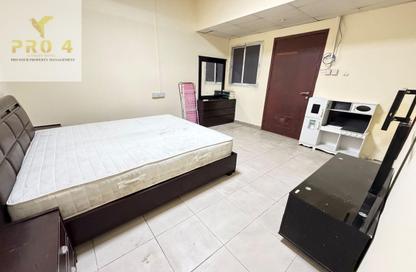 Apartment - Studio - 1 for rent in Al Karamah - Abu Dhabi
