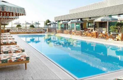 Apartment - 1 - 2 for sale in AG Central - Dubai Land Residence Complex - Dubai