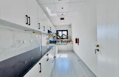 Apartment - 1 Bedroom - 2 Bathrooms for rent in Al Amir Hamad Building - International City Phase 2 - Al Warsan 4 - Al Warsan - Dubai