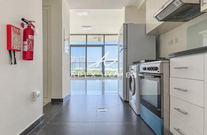 Apartment - Studio - 1 for rent in Golf Promenade 5A - Golf Promenade 5 - Golf Town - Damac Hills - Dubai