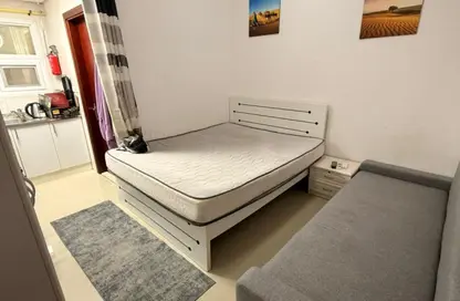 Apartment - Studio - 1 Bathroom for rent in Al Butina 9 Building - Al Butina - Sharjah
