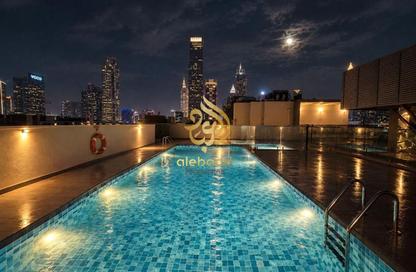 Apartment - 1 - 2 for rent in Ayhaco 7 - Jumeirah Garden City - Al Satwa - Dubai