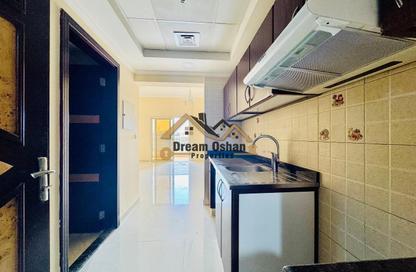 Apartment - Studio - 1 Bathroom for rent in Lootah Residence 2 - International City Phase 2 - Al Warsan 4 - Al Warsan - Dubai