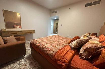Apartment - 1 Bedroom - 2 Bathrooms for sale in Orient Tower 1 - Orient Towers - Al Bustan - Ajman