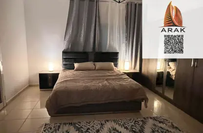 شقة - غرفة نوم - 2 حمامات للبيع في أورينت تاور 1 - أورينت تاور - البستان - عجمان