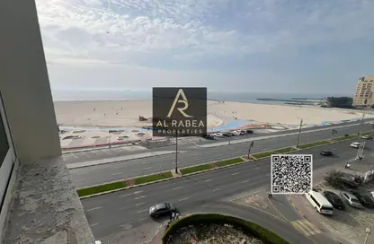 Apartment - 1 Bedroom - 1 Bathroom for rent in Corniche Tower - Ajman Corniche Road - Ajman