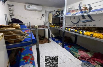 سكن عمال - استوديو - 7+ للايجار في المنطقة الصناعية رقم 2 - المنطقة الصناعية بالشارقة - الشارقة