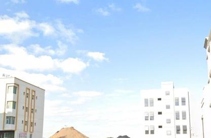 Land - Studio for sale in Orchid Towers - Tiger Downtown Ajman - Al Alia - Ajman