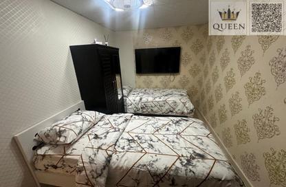 Apartment - 2 Bedrooms - 2 Bathrooms for sale in Oasis Tower - Al Rashidiya 1 - Al Rashidiya - Ajman