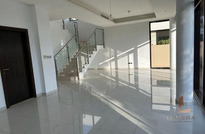 Villa - 5 Bedrooms - 6 Bathrooms for rent in Richmond - Damac Hills - Dubai