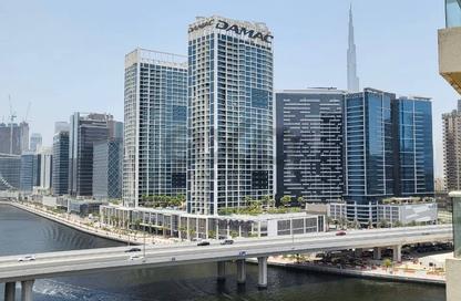 Apartment - 1 - 1 for sale in Mayfair Residency - Business Bay - Dubai